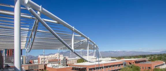 A view of the catalina mountains from the top of a building
