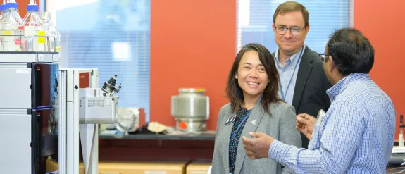 A researcher giving a tour of a lab space